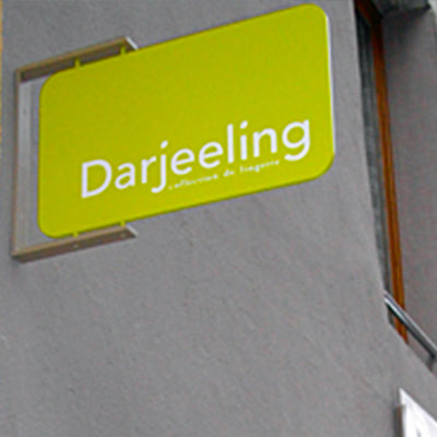 Indoor and outdoor illuminated signs and double-sided flag signs in Annecy