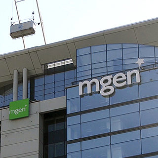 A sign installed on a high-rise building